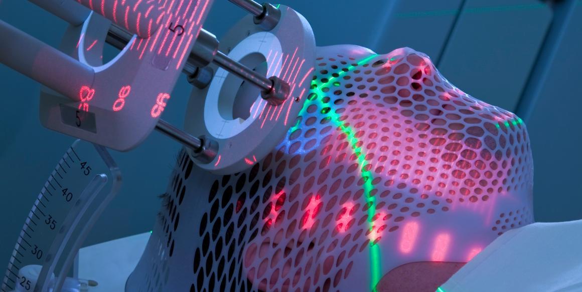 Photo of a man getting radiation treatment.