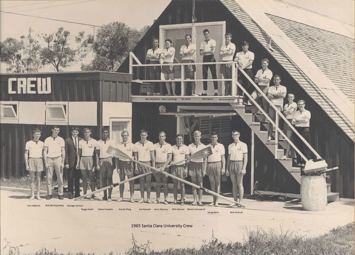 A group of young men in front of a building with a sign reading 