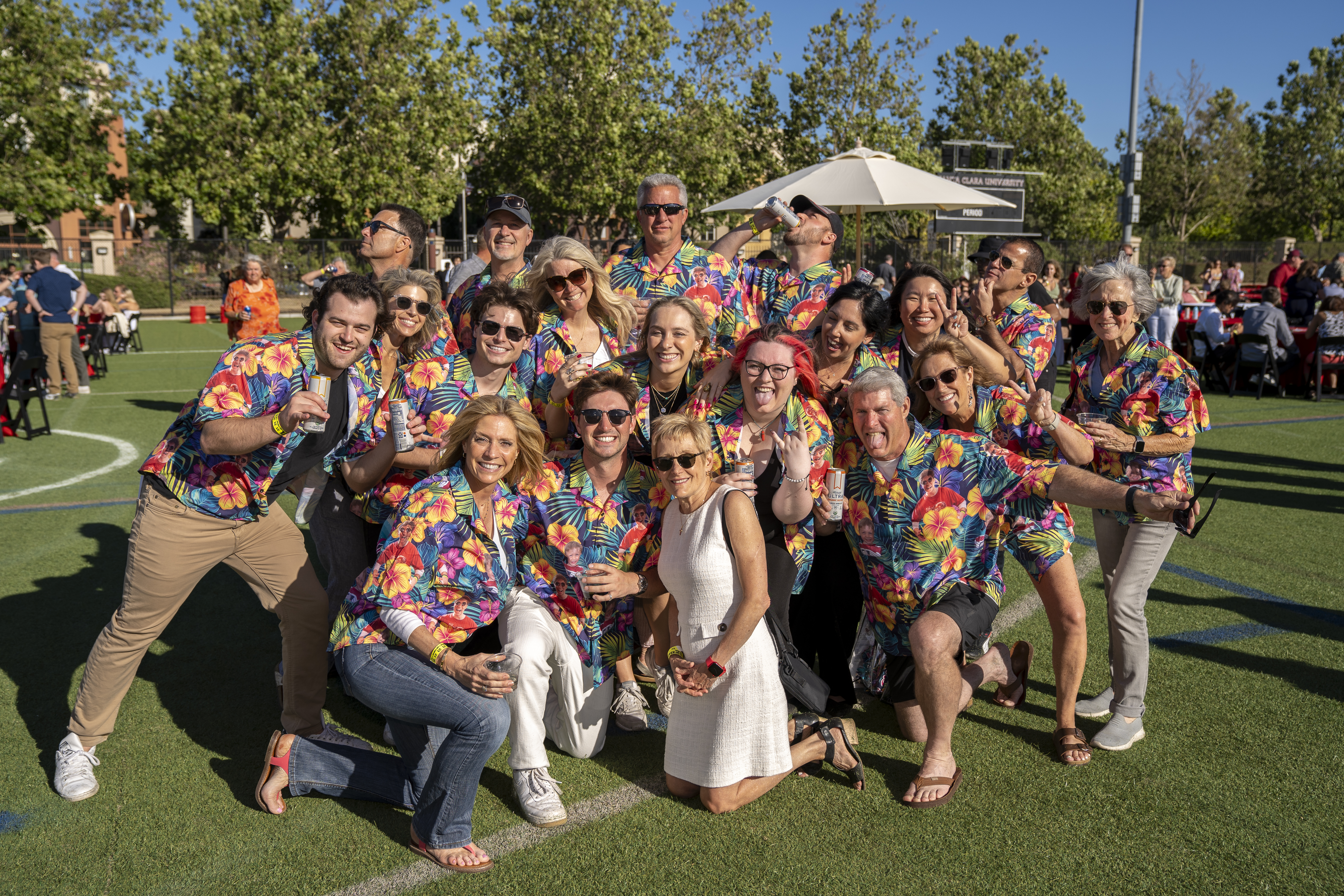 Family photo wearing Hawaiian shirts at Grad Bash 2024