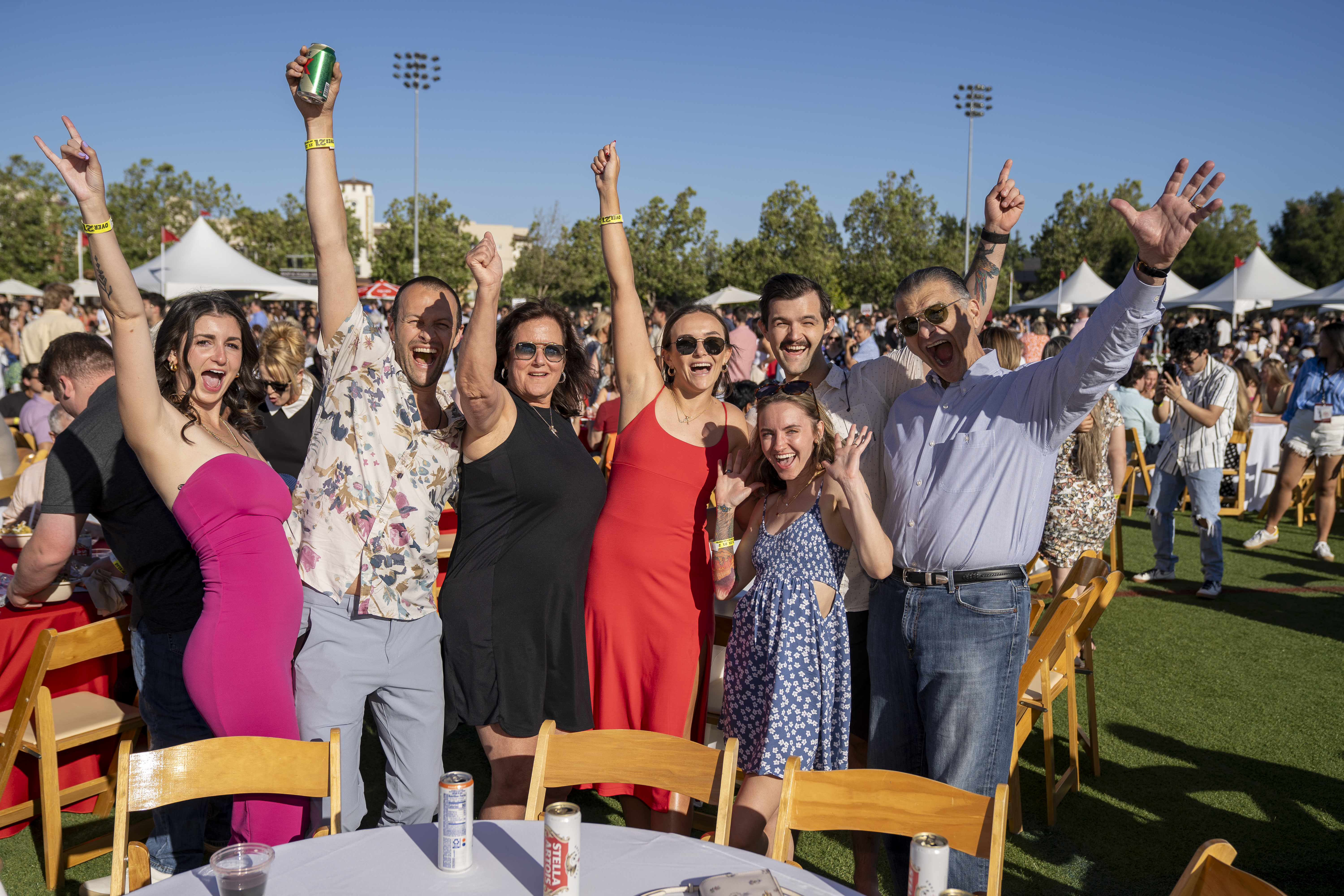 Family photo cheering at Grad Bash 2024