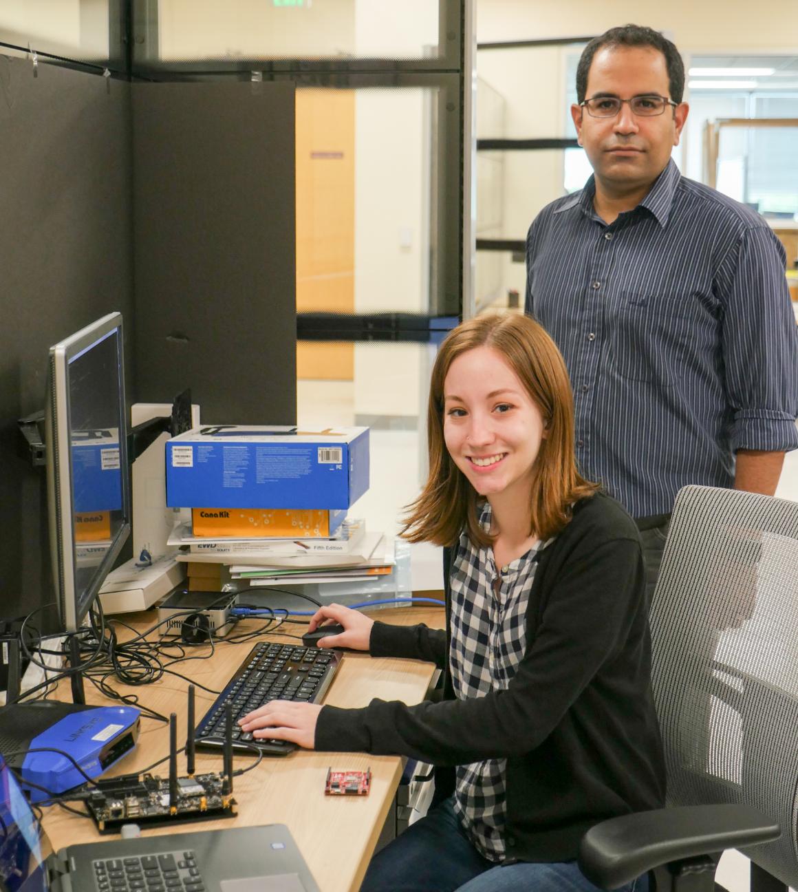 Assistant Professor Behnam Dezfouli and senior Angelina Poole