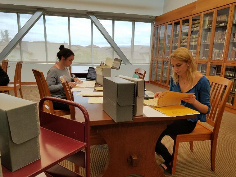 Students using A&SC materials in the Reading Room